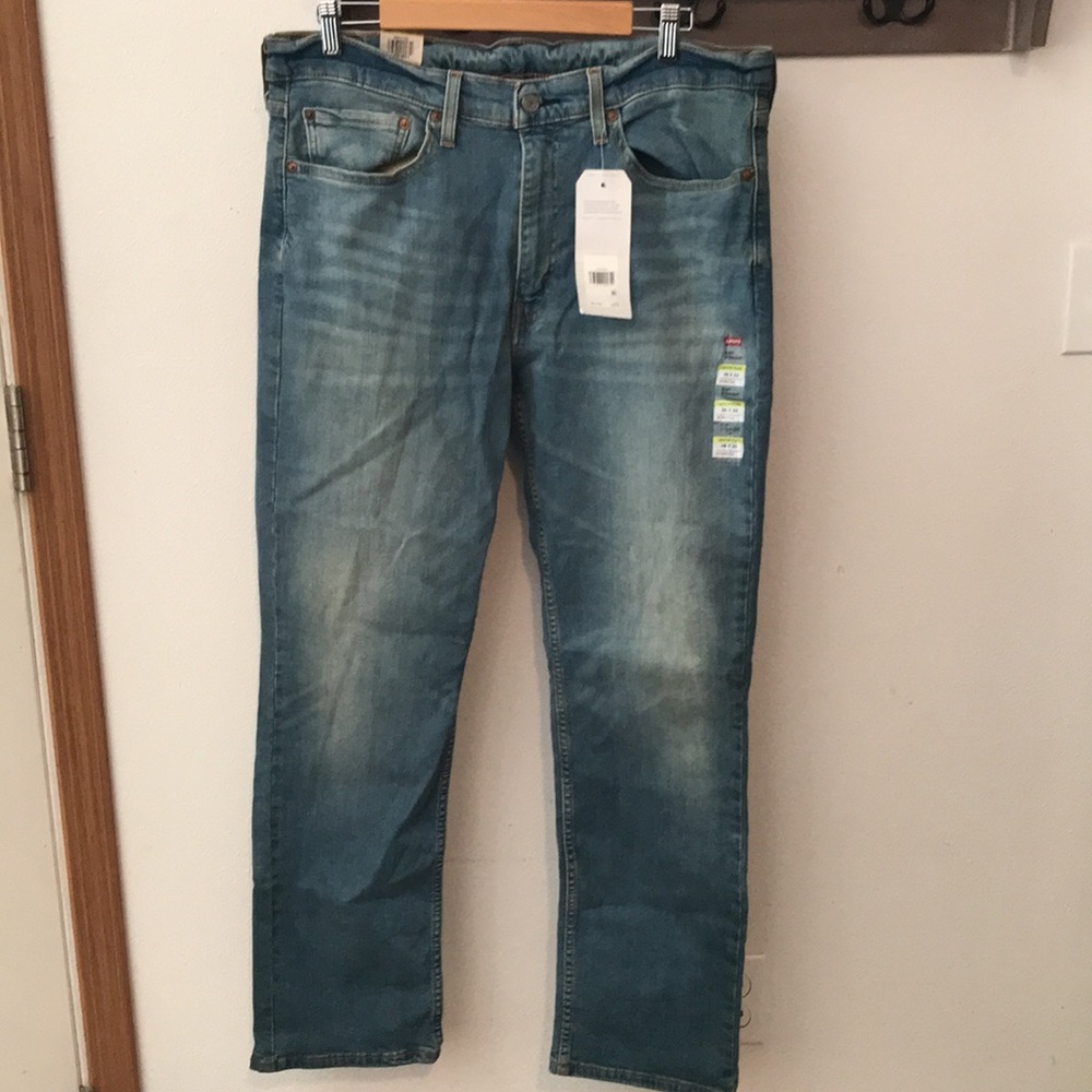 Levi’s 514 jeans zipper blue, stretch, below waist, reg fit thru thigh W…